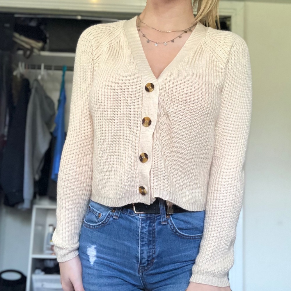 Buttoned up top